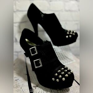 G By GUESS booties, with sliver studs, buckles and side zip, size 8.5.